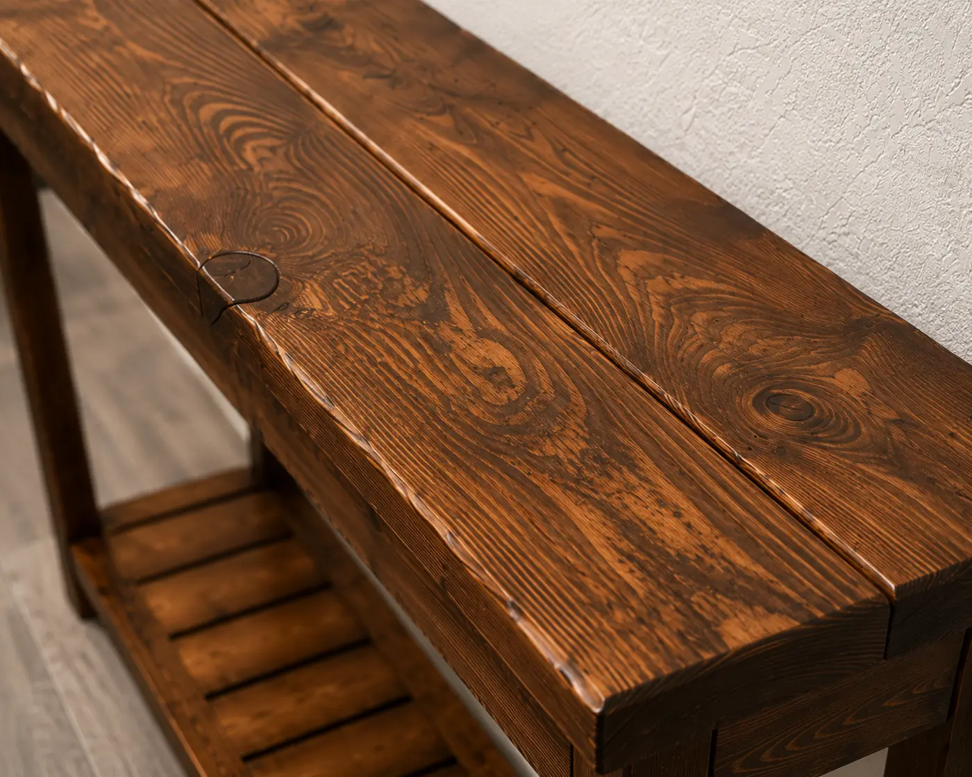 Close view of the hand-finished solid pine console tabletop