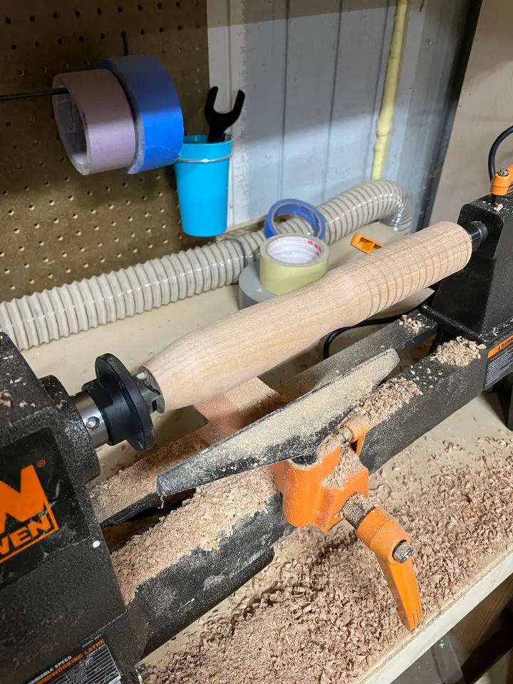 Striped cutting board being routed on a CNC