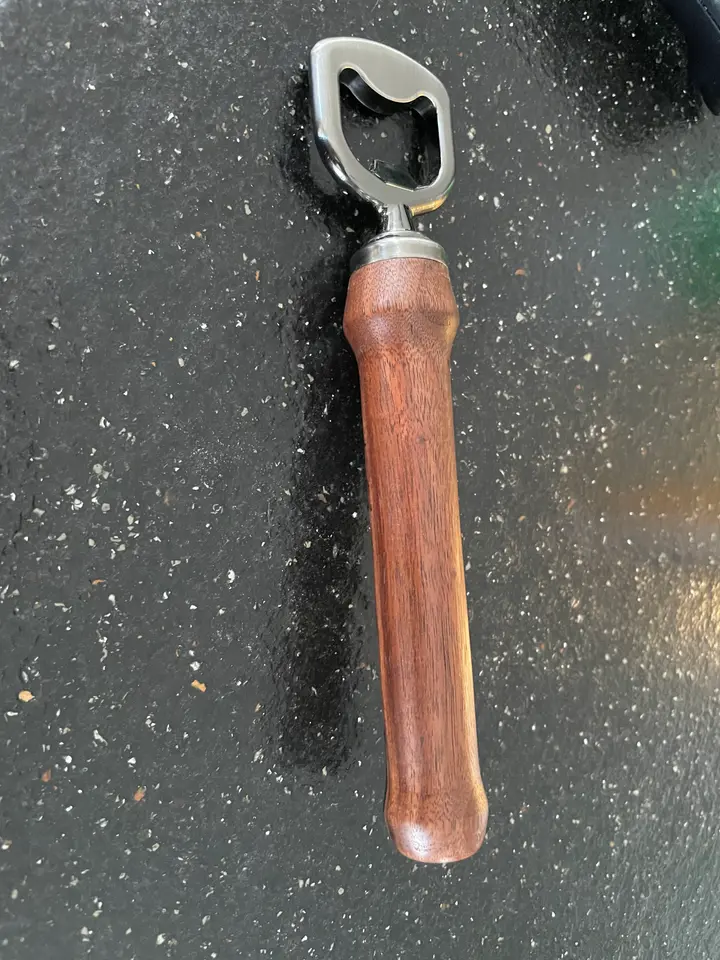 Wood spindle being shaped on a lathe